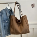 Minimalist large canvas tote bag in dark brown finish for daily commuting style - Brown