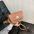 Vintage brown saddle bag with gold metal buckle and silk scarf wrapped handle strap - Brown