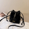 Fashionable black leather bucket bag with gold metal buckle and JING PIN brand tag - Black