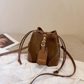 Vintage brown PU leather bucket bag with gold buckle detail and drawstring closure - Brown