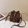 Deep brown retro contrast bucket bag with textured faux leather and drawstring closure - Brown