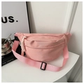 Pink canvas waist bag with adjustable strap and decorative cord detail in minimalist setting - Pink