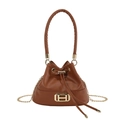 Minimalist dark brown leather bucket bag with gold H logo and drawstring closure - Brown