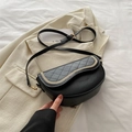 Chic black saddle crossbody bag with quilted diamond pattern and gold chain trim - Black