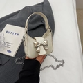 Mini white leather handbag with silver metal bow accent and chain shoulder strap - Off White