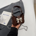 Deep brown mini handbag with silver bow detail and metallic chain strap for women - Coffee