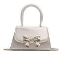 Mini borsa a mano argento metallizzato con fiocco dorato e tracolla a catena da donna - Argento