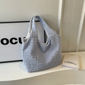 Light blue bubble textured pleated tote bag with chic seersucker fabric and minimalist style - Blue