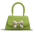 Mini lime green crossbody bag with a large silver bow and chain strap - Green