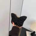 Borsa a farfalla nera con paillettes luccicanti e tracolla a catena in metallo dorato - Nero