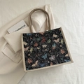 Bolso tote de tela negra con motivos de mariposas de colores y asas de cáñamo - Negro