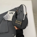 Minimalist black crescent moon handbag with gold rectangular buckle and leather strap - Black