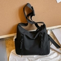 Large black nylon tote bag with dual front zippers and adjustable shoulder strap - Black