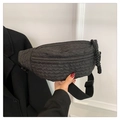 Black quilted crescent chest bag with adjustable strap and textured woven knot detail - Black