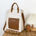 Minimalistische Canvas-Einkaufstasche mit braunen Trägern und großem Fassungsvermögen - Weiß und Braun