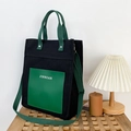 Große Canvas-Tragetasche in Schwarz mit grünen Riemen und JINNIAN-Markenlogo-Aufdruck - Schwarz & Grün