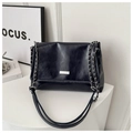 Detail of glossy oil-wax leather shoulder bag with silver chain strap and metal logo - Blue