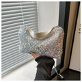 Detailed view of shimmering sequins and silver chain strap on a stylish handbag - White