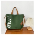 Sac fourre-tout en toile vert foncé avec anses brunes et lettrage JINNIAN blanc - Vert