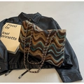 Close-up of knit tote bag featuring wavy retro patterns and premium metal chain strap - Coffee