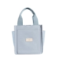 Sac fourre-tout carré en toile bleu clair avec poches latérales et écusson logo N en cuir - Bleu
