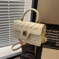 Chic beige quilted crossbody bag with clover lock and top handle for women - Off-white