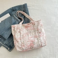 Sac cabas en toile rose avec motif floral rouge et poche frontale pratique - Rose