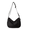 Black crescent nylon crossbody bag with adjustable printed strap and side fashion label - Black