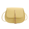 Minimalist light yellow saddle crossbody bag with golden tassel decoration for women - Yellow