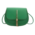 Grass green crossbody saddle bag with golden tassel decoration and smooth leather finish - Green