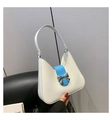 Fashionable saddle bag in cream and blue with a metallic silver bow accent - Large / White