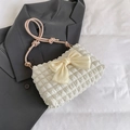 White pleated underarm bag with large beige satin bow and pink knotted shoulder strap - Pink