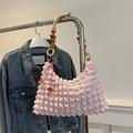 Pink pleated shoulder bag with wooden bead handle and decorative charms for women - Pink