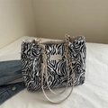 Fashionable zebra print canvas tote bag with leather straps and golden chain accents - Zebra Print