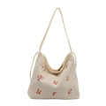 Borsa tote in velluto a coste bianco sporco con stampa Our Future rossa e tracolla - Bianco Sporco