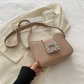 Chic beige crescent shoulder bag with a rectangular rhinestone buckle and leather strap - Khaki