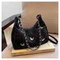 Detail of black hobo bag with marble texture pleats and silver butterfly charms - Black