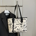 White tote bag with black street style graffiti prints and slim shoulder straps - Black