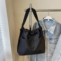 Minimalist black drawstring bucket bag with adjustable strap for casual daily use - Black