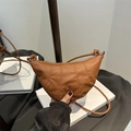 Brown leather croissant shoulder bag with pleated details and stylish knot handle - Brown