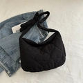 Black heart-quilted tote bag with stylish knotted shoulder strap and nylon texture - Black
