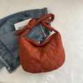 Terracotta quilted tote bag with heart stitching and bow knot shoulder strap - Orange