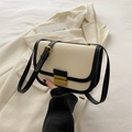 Retro canvas and black leather crossbody saddle bag with polished gold metal clasp - Black