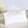 White pearlescent lace laser cut wedding place card with intricate crown pattern - White