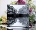Laser-cut wedding invitation with black silk ribbon bow and shimmer grey laser-cut design - Charcoal Black