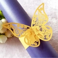 Laser-cut butterfly napkin ring in golden yellow pearl paper for elegant wedding decor - Gold