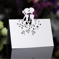 Laser cut wedding place card with kissing couple silhouette and heart design - White
