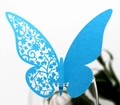 Macro shot of laser-cut blue butterfly card for wedding wine glass decoration - Sky Blue