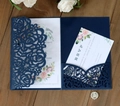 Detail of laser-cut navy rose lace wedding invitation with white floral RSVP card - Dark Blue