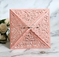 Elegant laser-cut rose gold invitation card with intricate floral cutout pattern - Pink